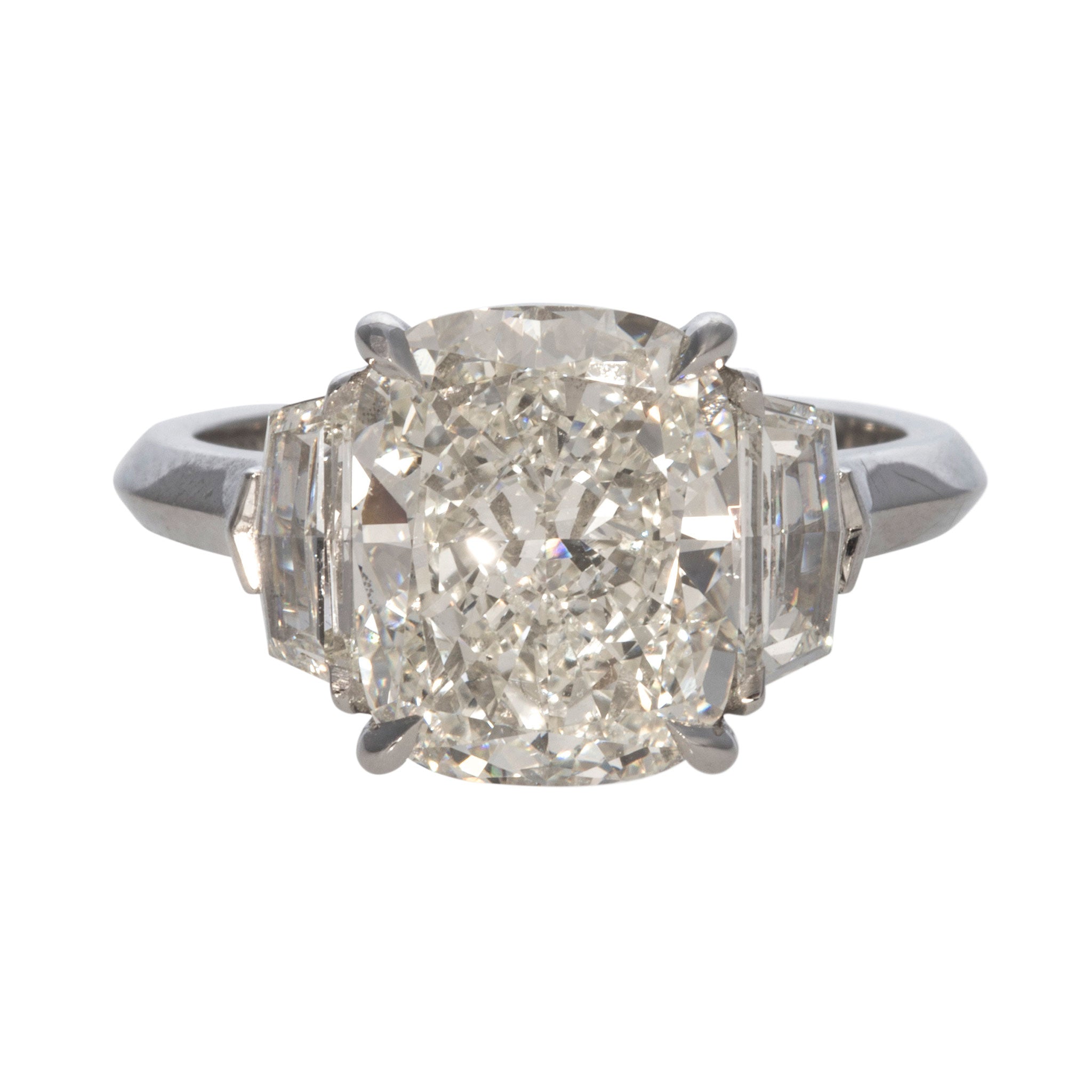 4ct Cushion Center & .62ct Side Diamond Three-Stone Platinum Ring