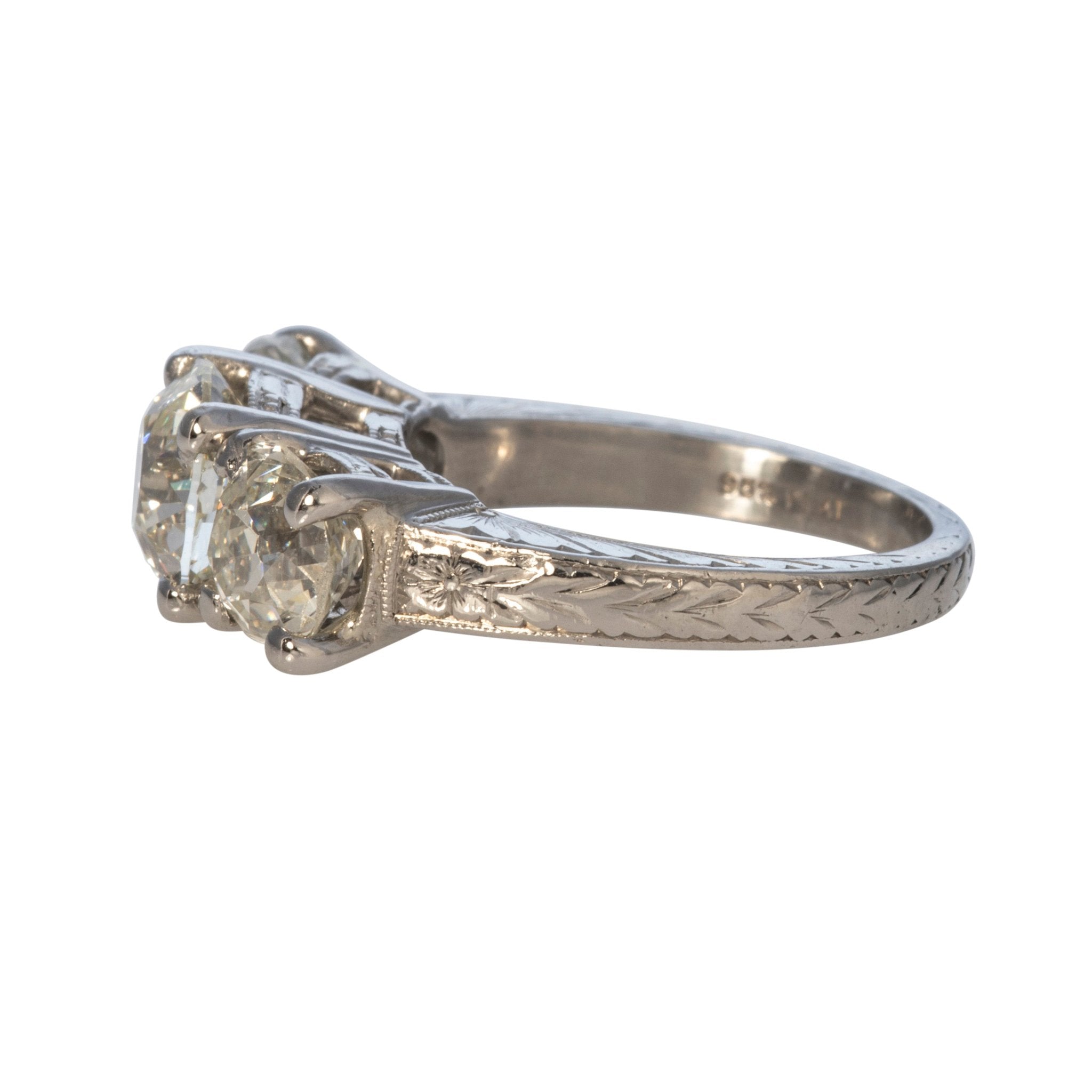 Vintage Round Diamond Three-Stone Platinum Ring