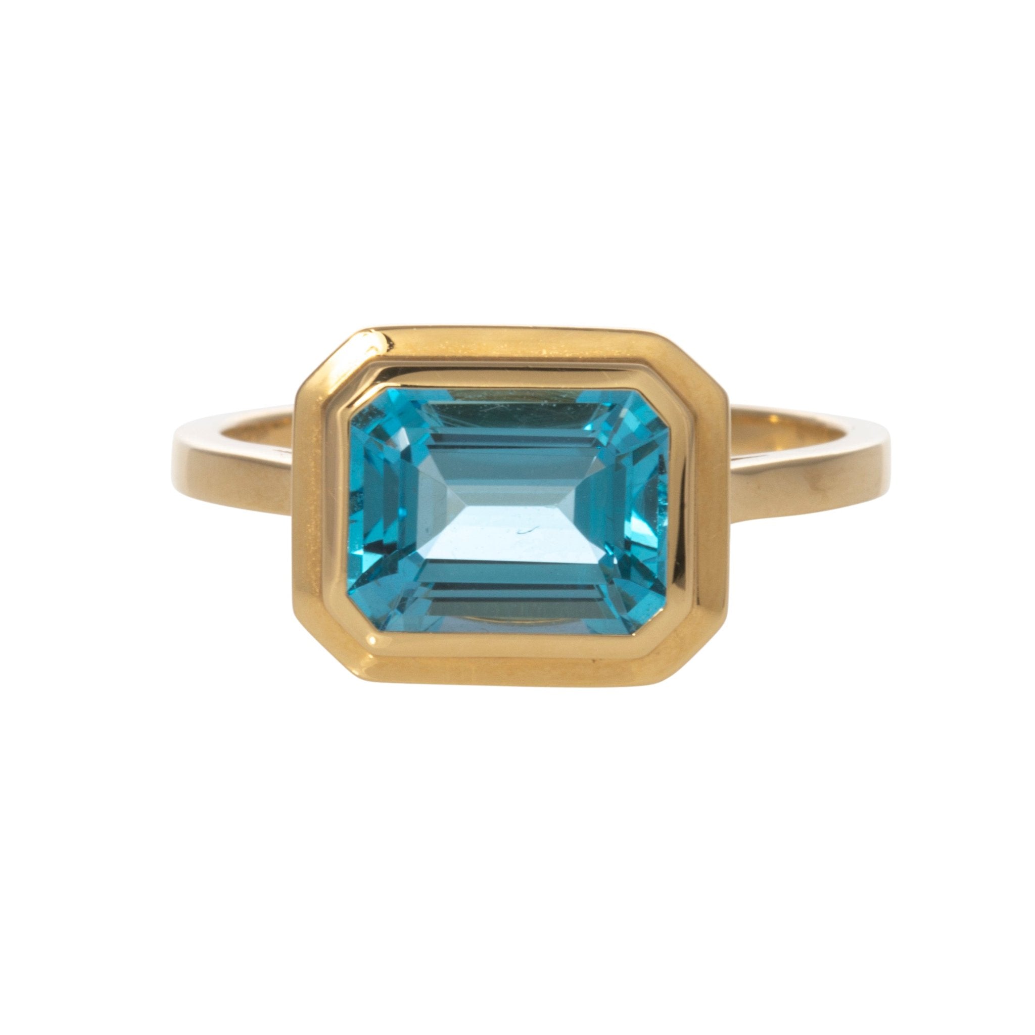 Goshwara Emerald Cut Blue Topaz Bezel Set 18K Gold Ring