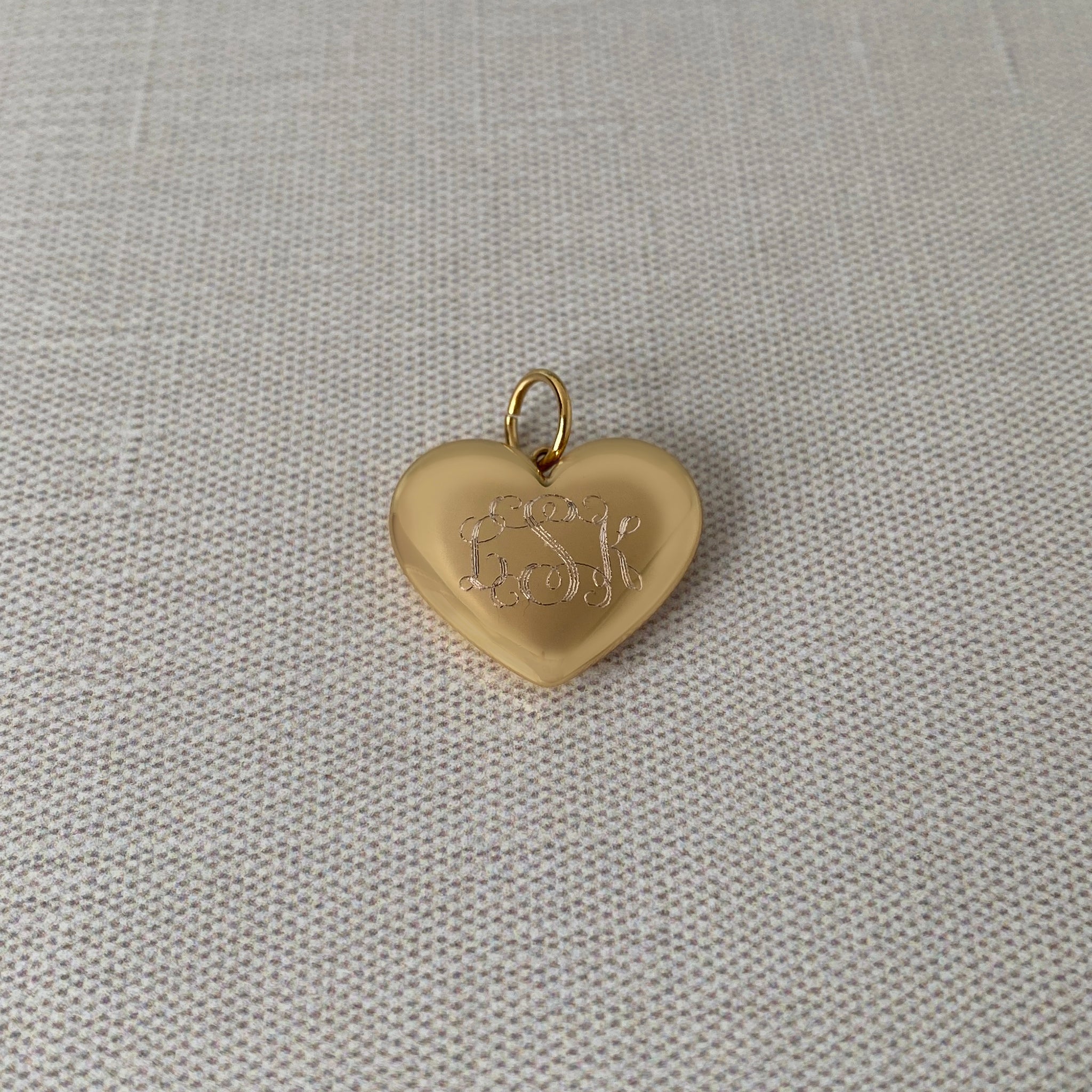 Goldbug Puffy Heart Charm with machine engraved interlocking script monogram