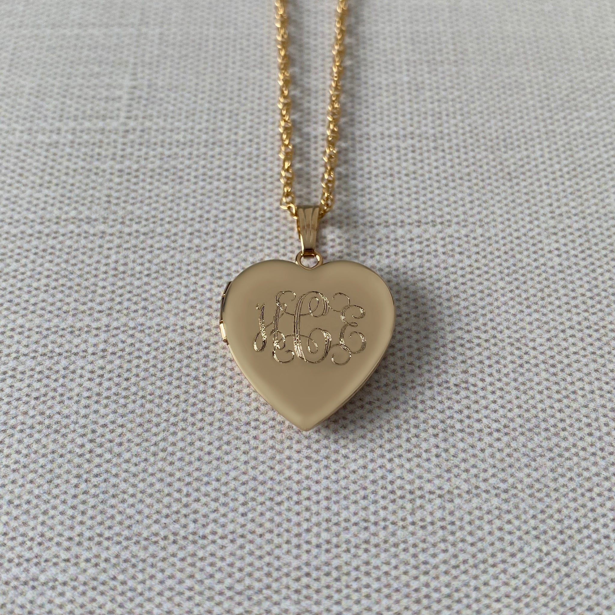 Antique small on sale 14k gold filled heart engraved locket pendant