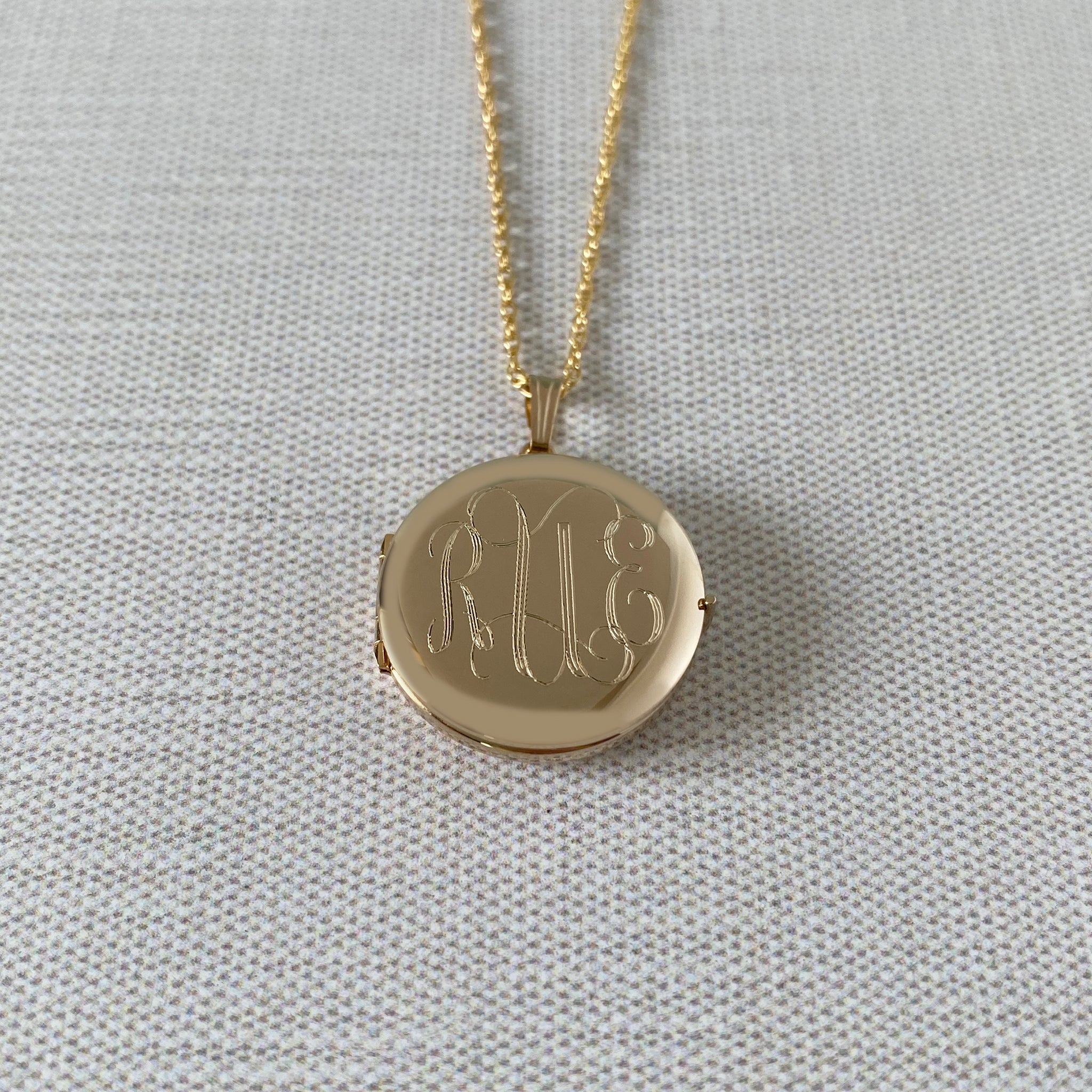 14K Gold Filled 23mm Round 4 Photo Locket Necklace with machine engraved interlocking script monogram